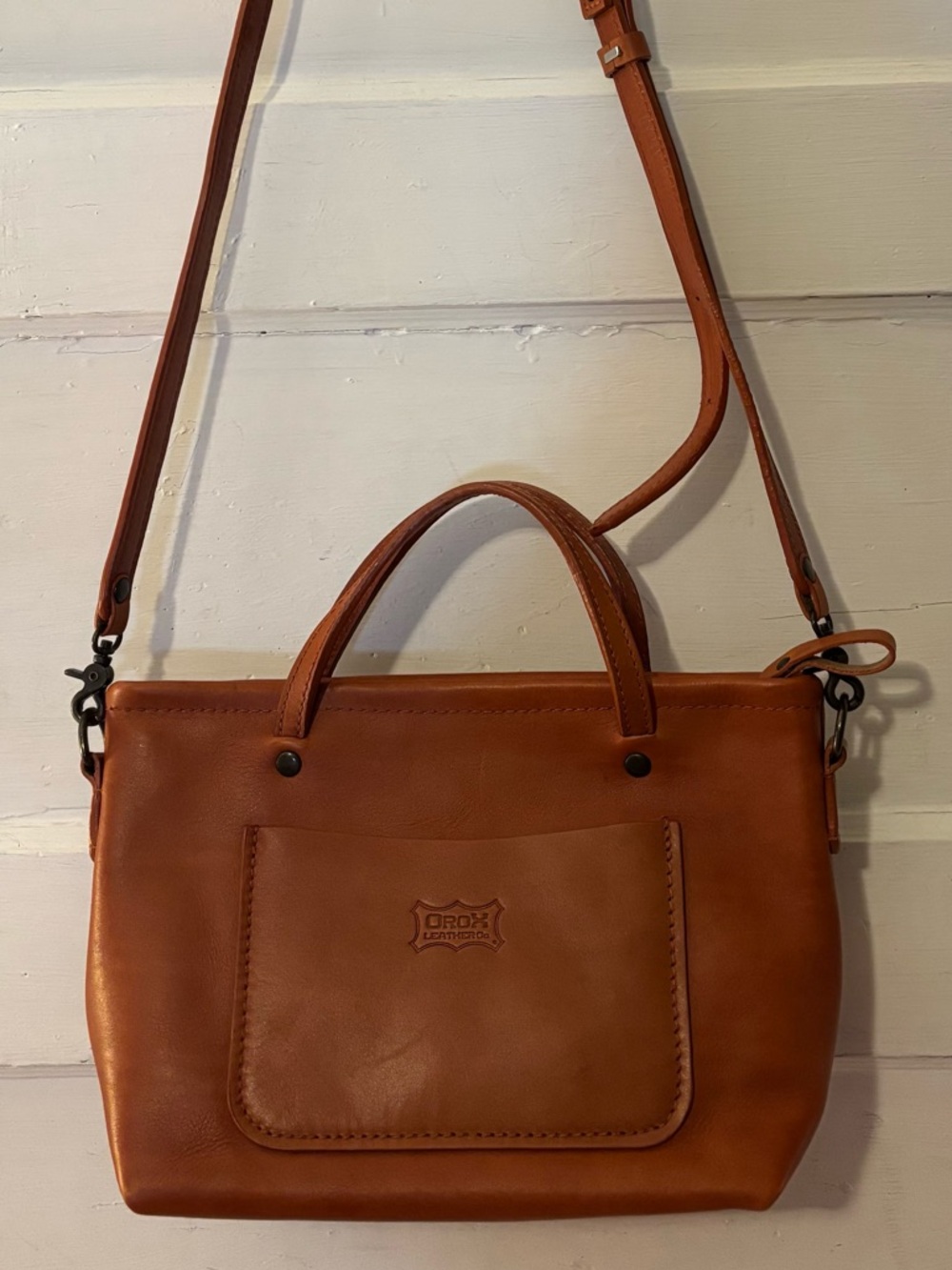 Orox Leather Co. Merces Cross handbag in amber/cognac brown